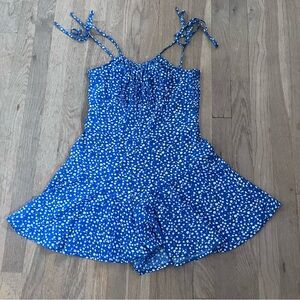 Medium Blue Floral Romper • Spaghetti Tie Straps • Smocked Back & Flutter Shorts